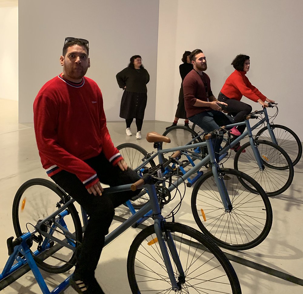 artists riding bikes