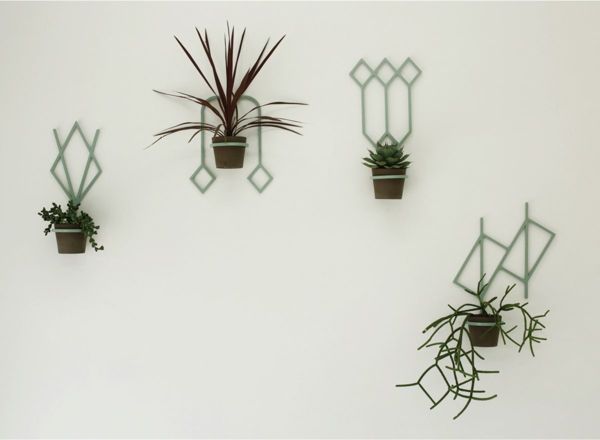 Jessie Mitchell, L to R Sunset, Harley, Bourke, Lincoln (2012) powder coated aluminium, ceramic pot, and various plants. Dimensions variable. Courtesy the artist. 