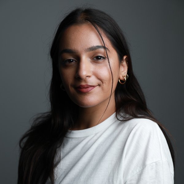 Justine Youssef, portrait in white tshirt