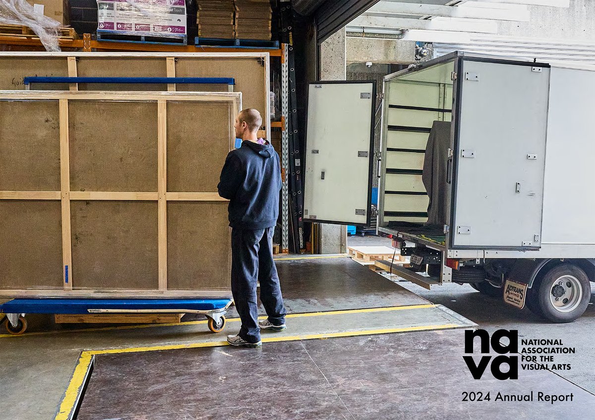 A person prepares to load large framed artworks onto a truck at a loading dock. The image is captioned with the National Association for the Visual Arts (NAVA) logo and reads “2024 Annual Report.”